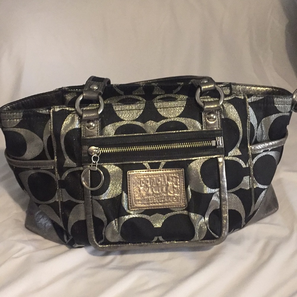 Black and silver Coach Poppy bag.